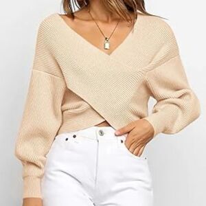 BTFBM wrap-style, off-the-shoulder, ribbed knit sweater.